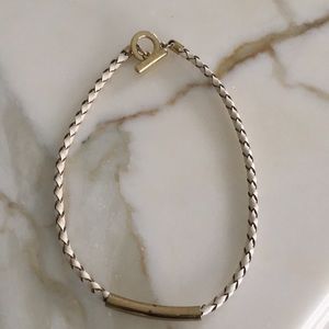 White & Gold leather choker with gold bar.
